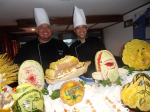 Roberto Urgiles and Xavier Mancayo show off their culinary carvings and sculptures.