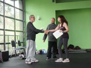 Here's Sinead, my other West Coast Fitness coworker who took the training, proudly receiving her certificate. 