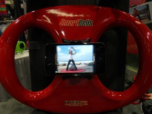 New SmartBells by Think Fit are weights with a phone holder. Choose from a huge series of videos that guide you through SmartBells workouts.
