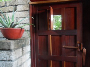 This little door within a door is for coffee. Every morning a thermos of fresh Nicaraguan coffee is delivered to your room! 