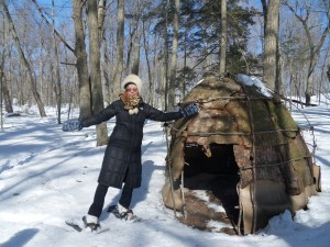 Here I show off my winter gear beside a recreation of a wigwam. Nomadic people lived in similar structures about 700 years ago.